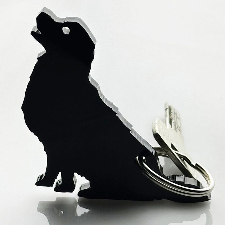 mo man tai - dog keychain