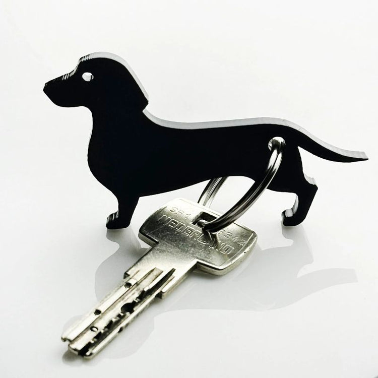 mo man tai - dog keychain